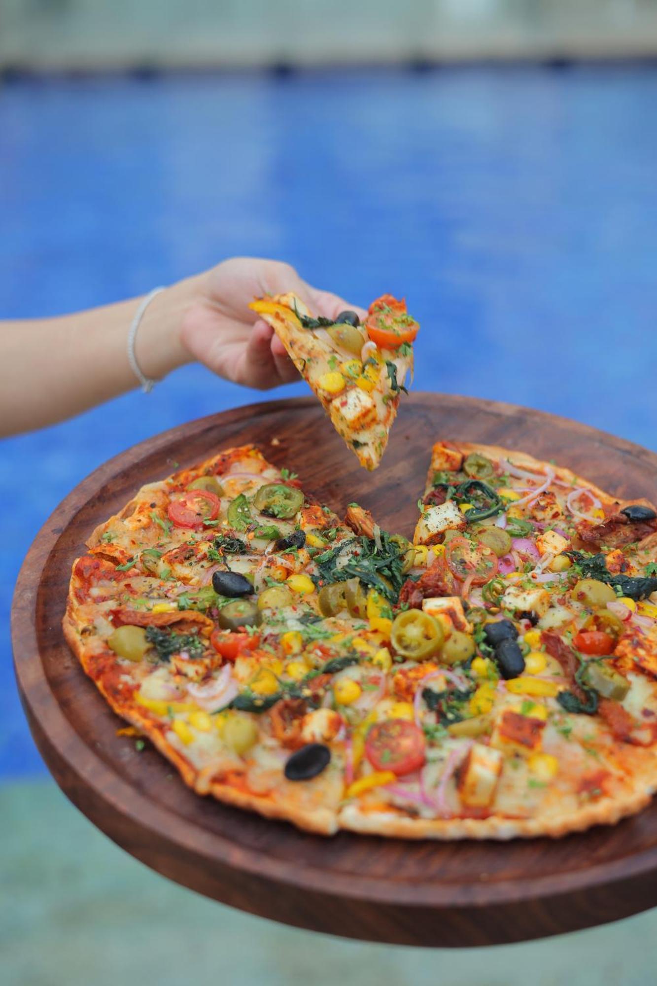 Novotel Hyderabad Airport Экстерьер фото A vegetarian pizza