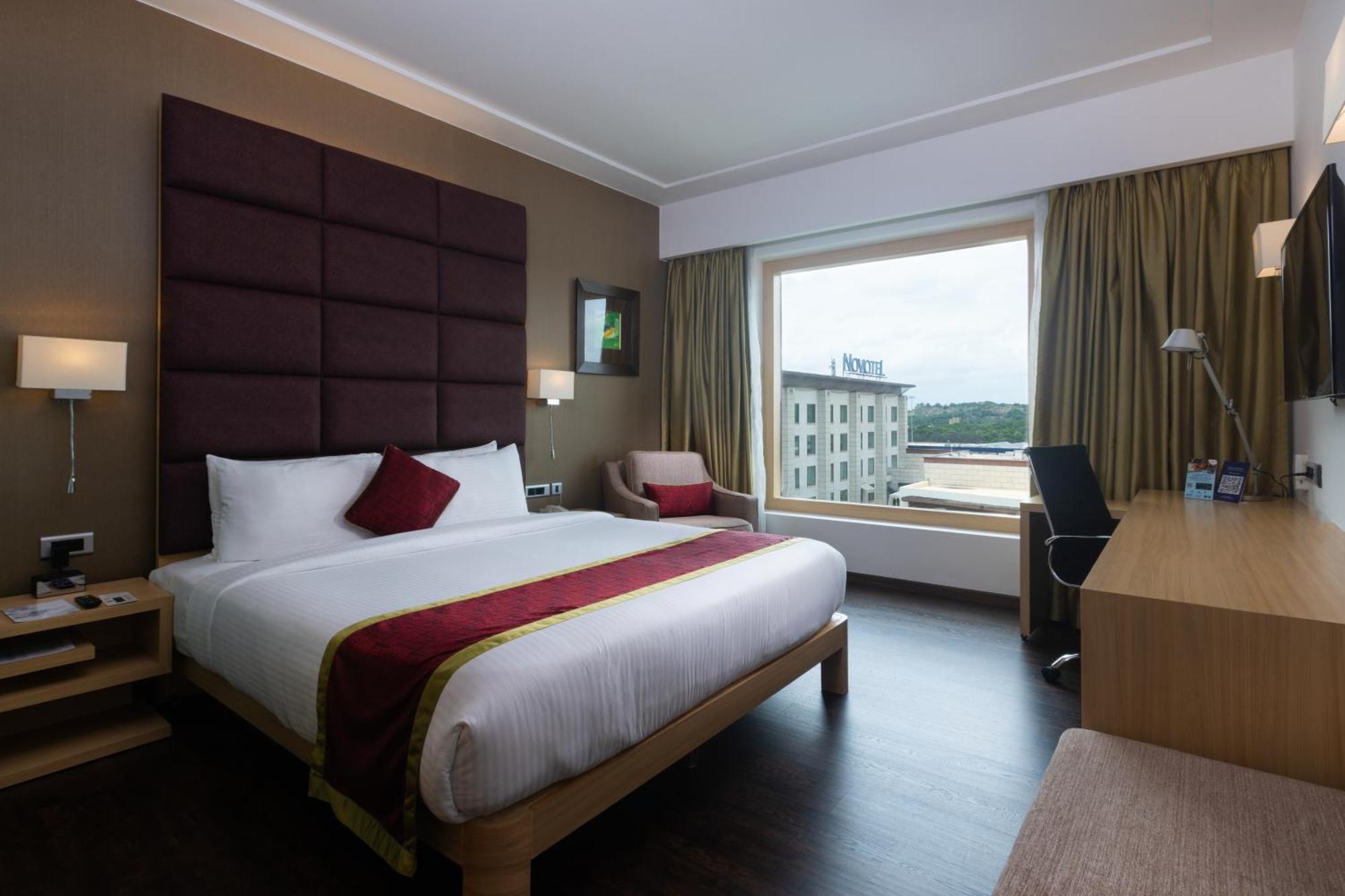 Novotel Hyderabad Airport Экстерьер фото A room at the hotel